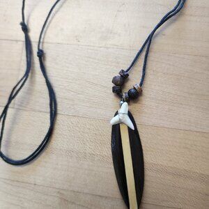 Necklace wooden surf board with shark tooth